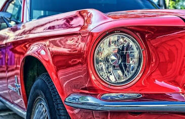 Front corner of a red mustang
